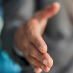 Hand reaching out.