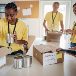 people packing donation boxes