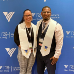 Tiffany and Junior pose for the camera with their VOA Ministry stoles.