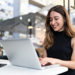 Woman working on a computer.