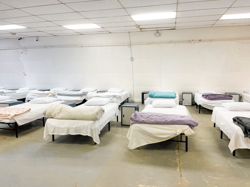 Row of beds in Code Blue shelter